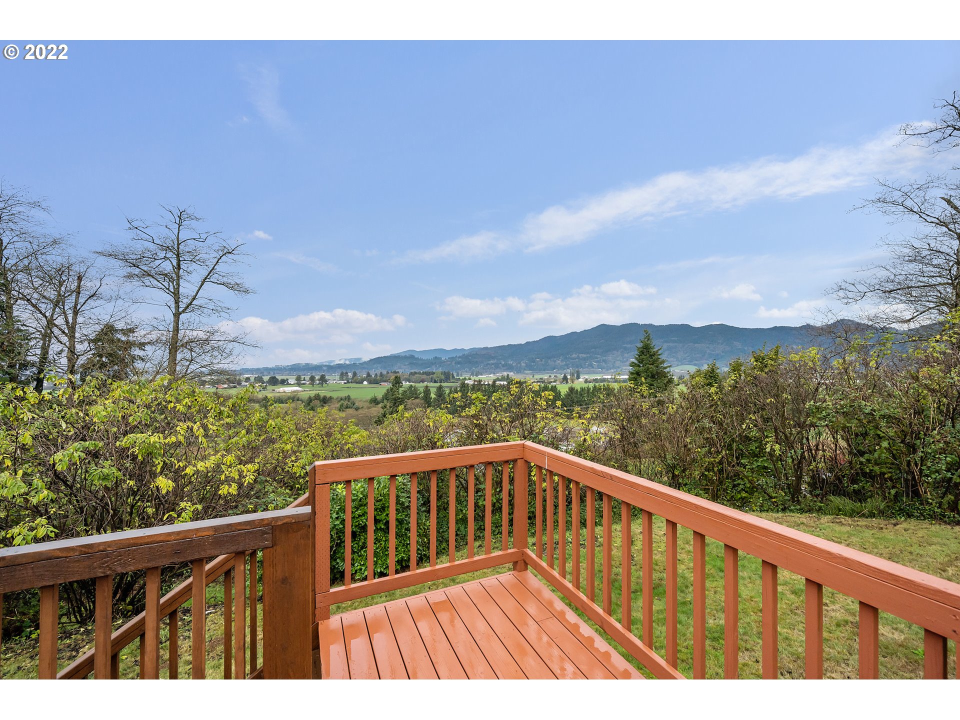 8020 Greentree Ridge Road Tillamook, OR 97141 - Photo 27 of 31 a view of balcony with wooden floor and fence
