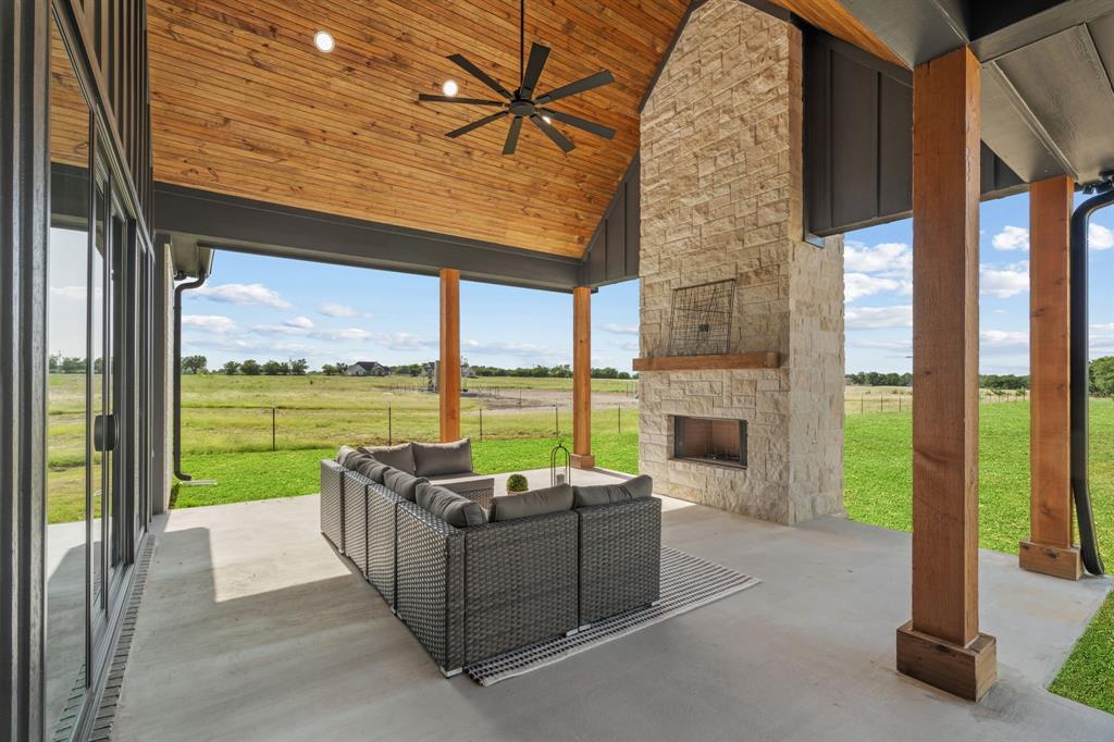 12160 Riek Road Krum, TX 76249 - Photo 29 of 39 Outdoor Fireplace