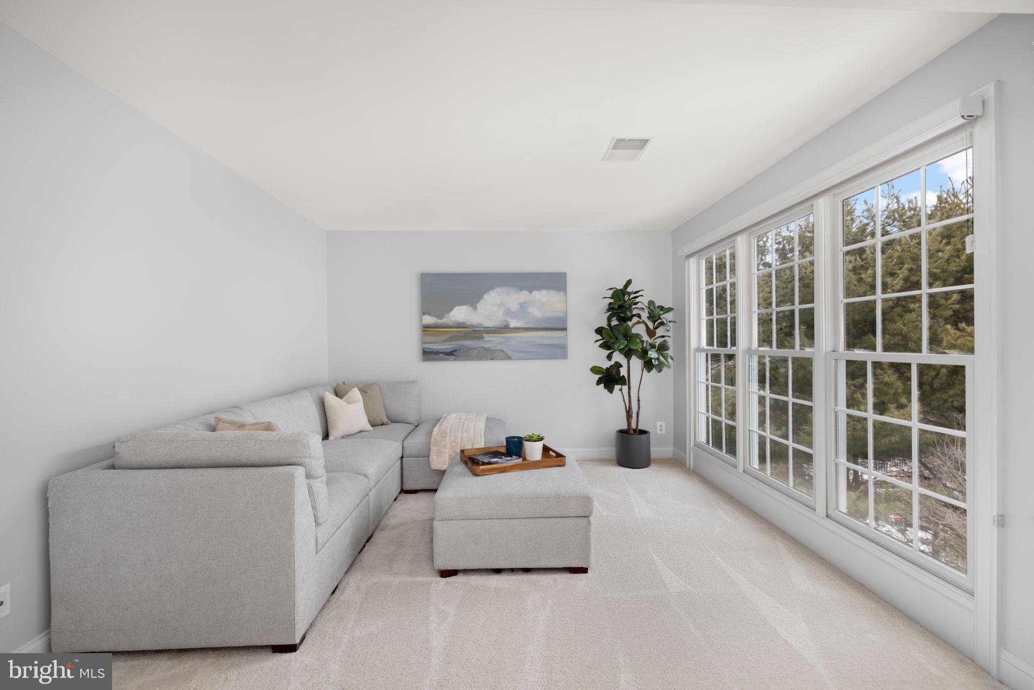 3257 Pony Ridge Way Oakton, VA 22124 - Photo 29 of 67 Primary suite sitting room with wall of windows