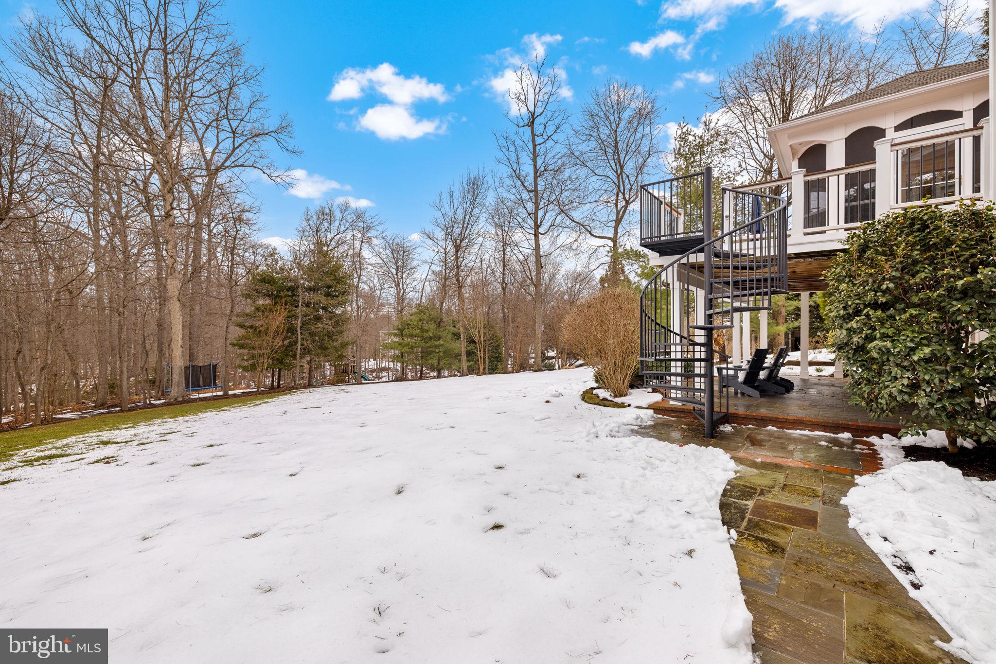 3257 Pony Ridge Way Oakton, VA 22124 - Photo 61 of 67 Circular staircase from deck to patio