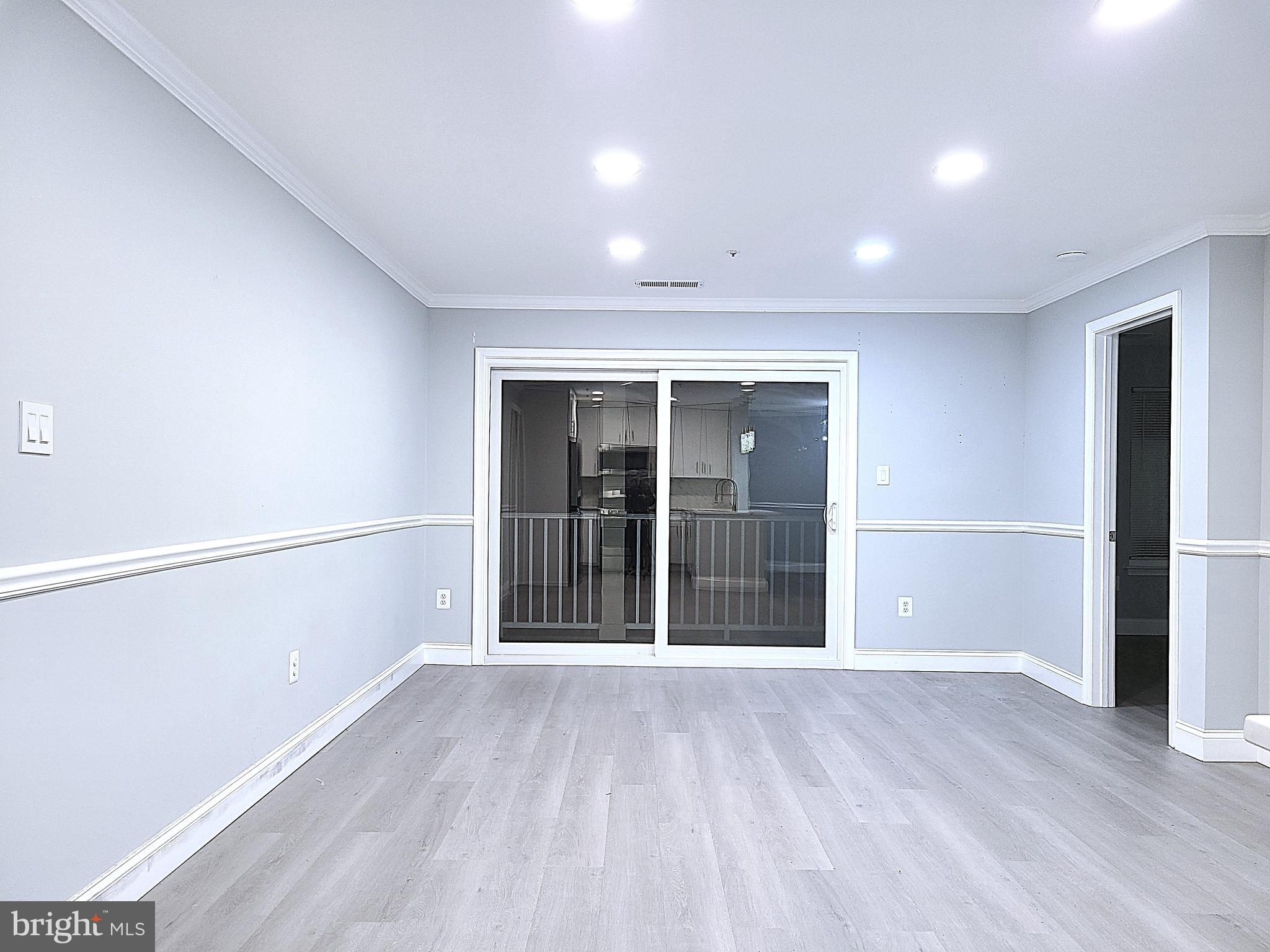 1049 Gardenview Loop, Unit 302 Woodbridge, VA 22191 - Photo 8 of 21 Living -New sliding door to Balcony