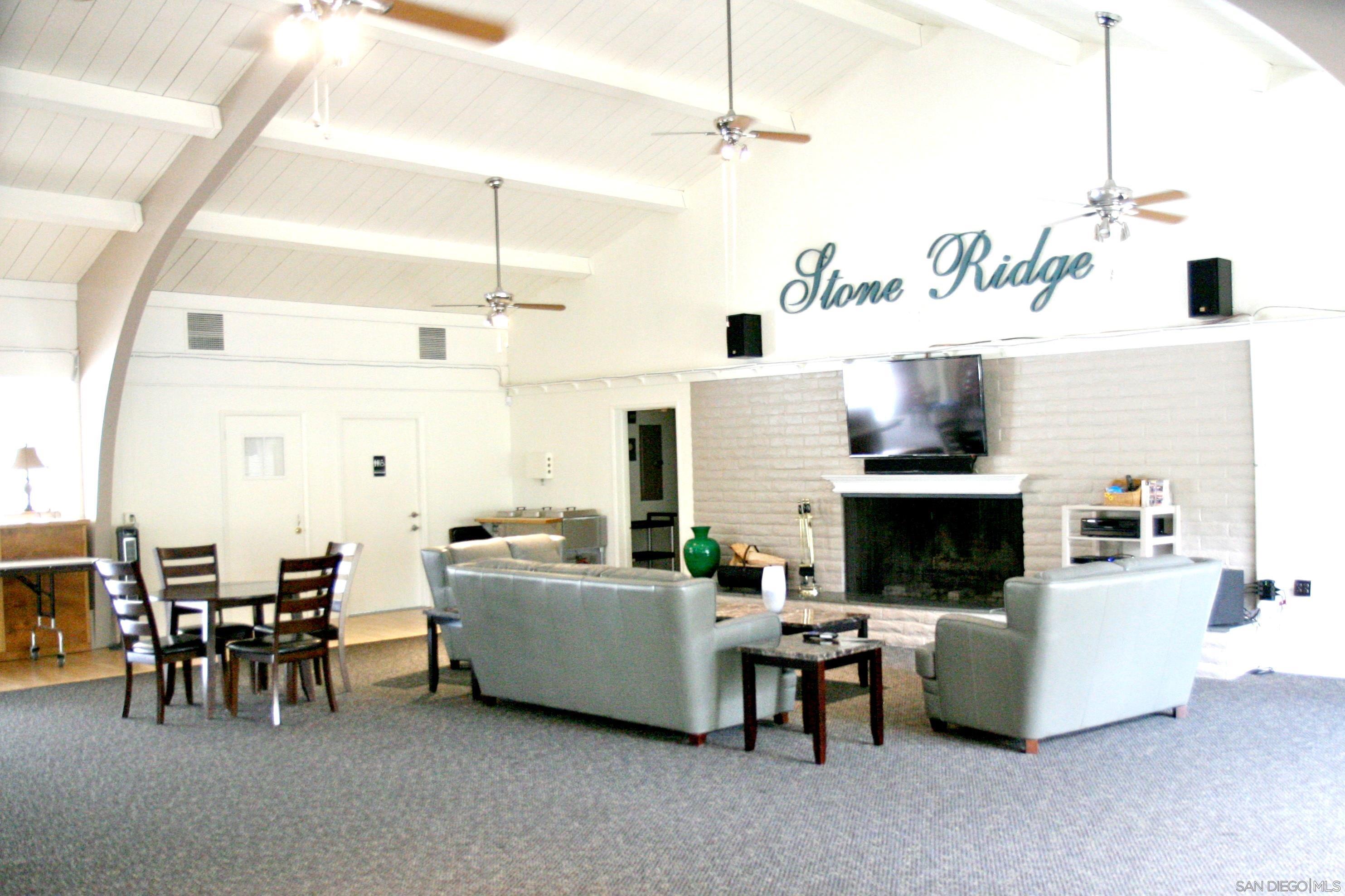 35109 Highway 79, Unit SPC/ # Warner Springs, CA 92086 - Photo 30 of 35 a living room with furniture and a chandelier