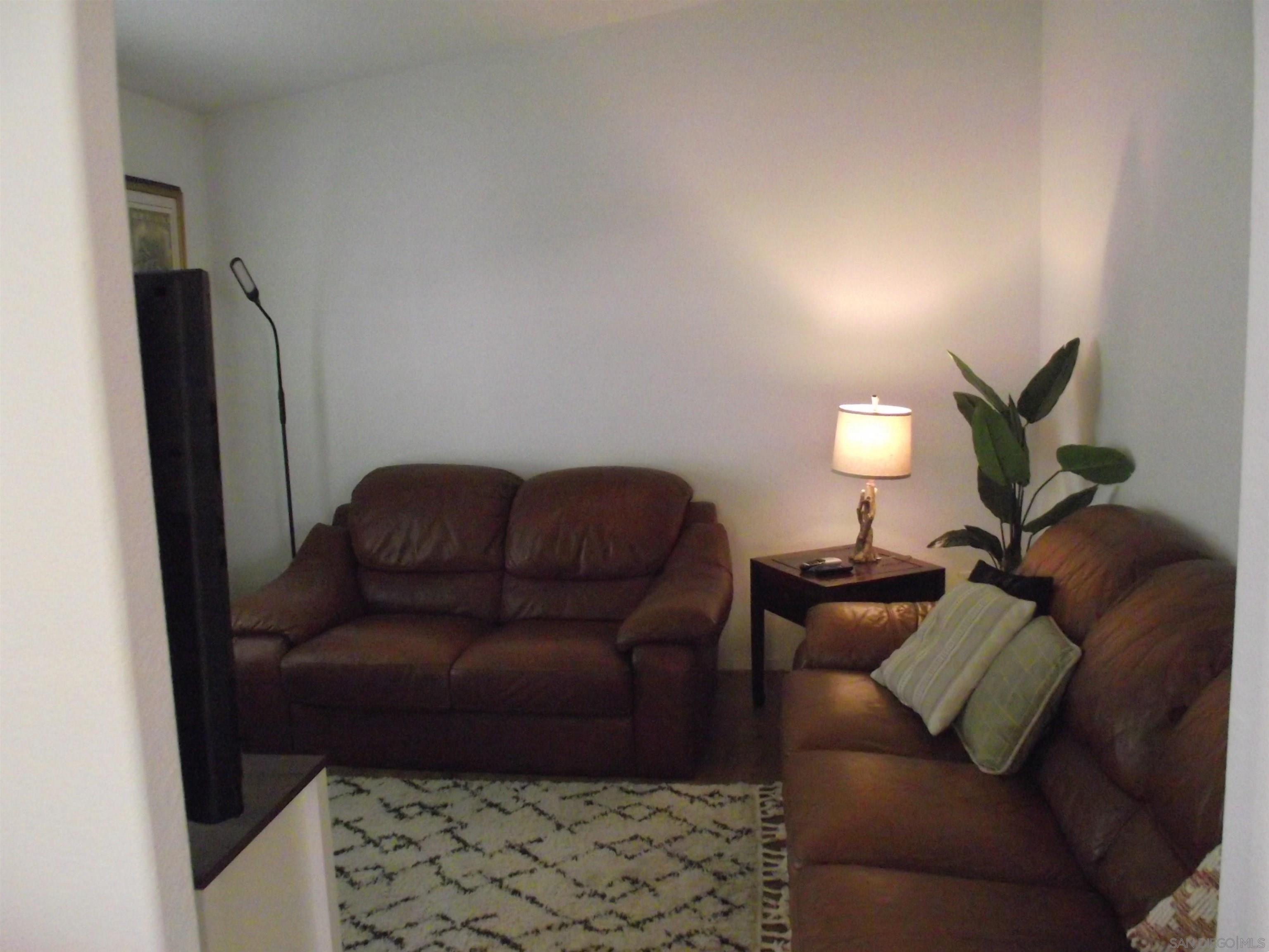 35109 Highway 79, Unit SPC/ # Warner Springs, CA 92086 - Photo 9 of 35 a living room with furniture and a flat screen tv