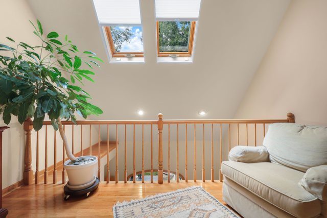 420 Timber Ridge Drive Bartlett, IL 60103 - Photo 14 of 23 a bedroom with furniture and a potted plant