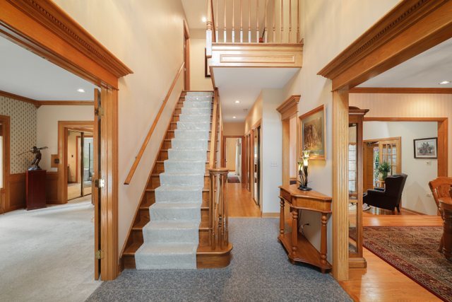 420 Timber Ridge Drive Bartlett, IL 60103 - Photo 10 of 23 a view of staircase with living room