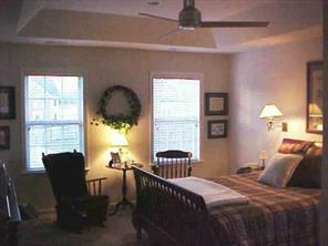 2609 High Ridge Court Fort Mill, SC 29707 - Photo 6 of 8 a bedroom with a bed and a chair
