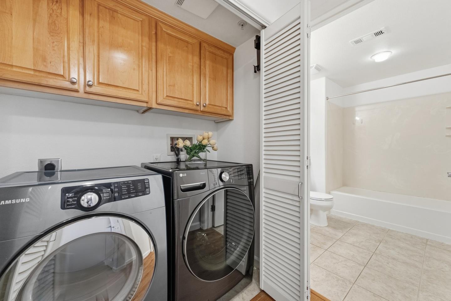 1390 Saddle Rack Street, Unit 223 San Jose, CA 95126 - Photo 20 of 36 a utility room with dryer and washer