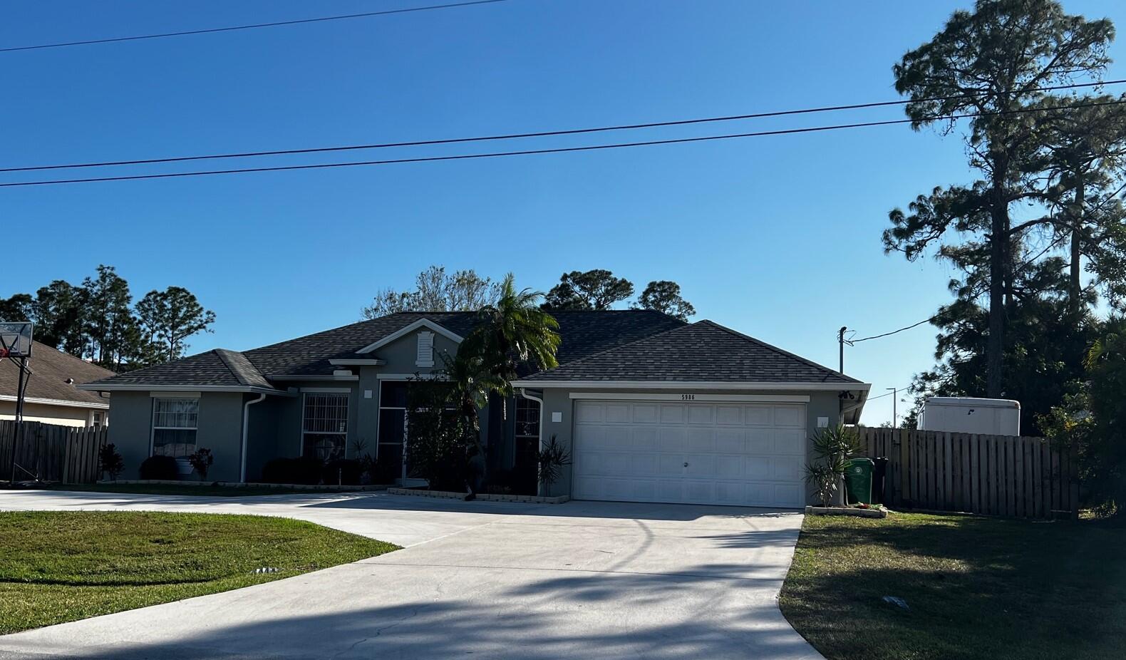 5986 Northwest Wolverine Road Port St. Lucie, FL 34986 - Photo 1 of 24 IMG_9844.jpg23