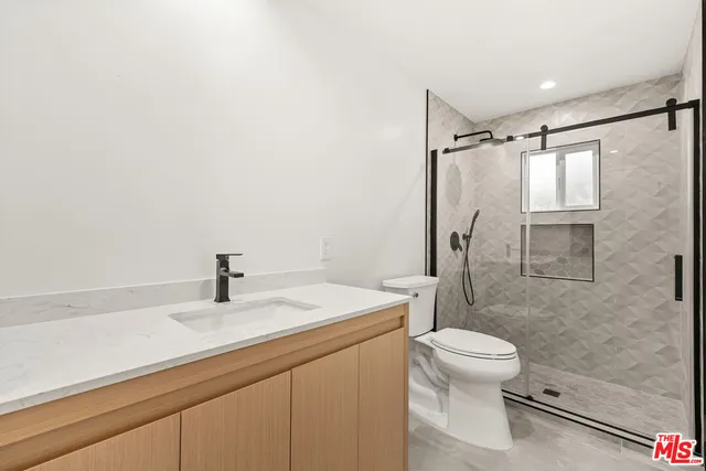 a house view with a backyard space