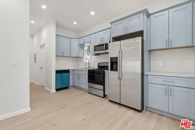 a bathroom with a toilet a sink and a bathtub
