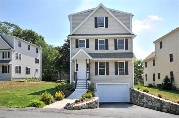8 Knowles Farm Road Arlington, MA 02474 - Photo 1 of 1 a front view of a house with a yard