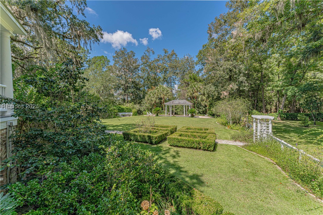 92 Dean Hall Road Seabrook, SC 29940 - Photo 50 of 99 Corner view from primary residence to North lawn