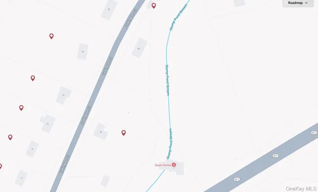 a view of swimming pool with a yard