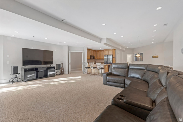 3222 Eagle View Circle Sandy, UT 84092 - Photo 33 of 60 Living room featuring light carpet and recessed lighting