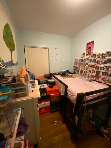 a bed room with a bed and a couch