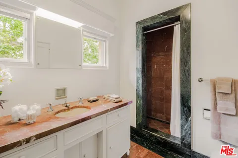 a view of a livingroom with furniture and workspace