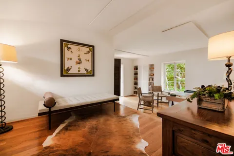 a view of a park with large trees