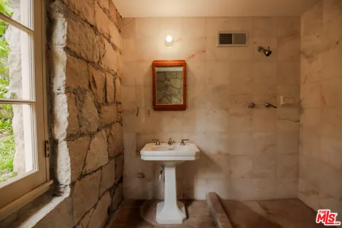 a view of swimming pool with outdoor seating and yard