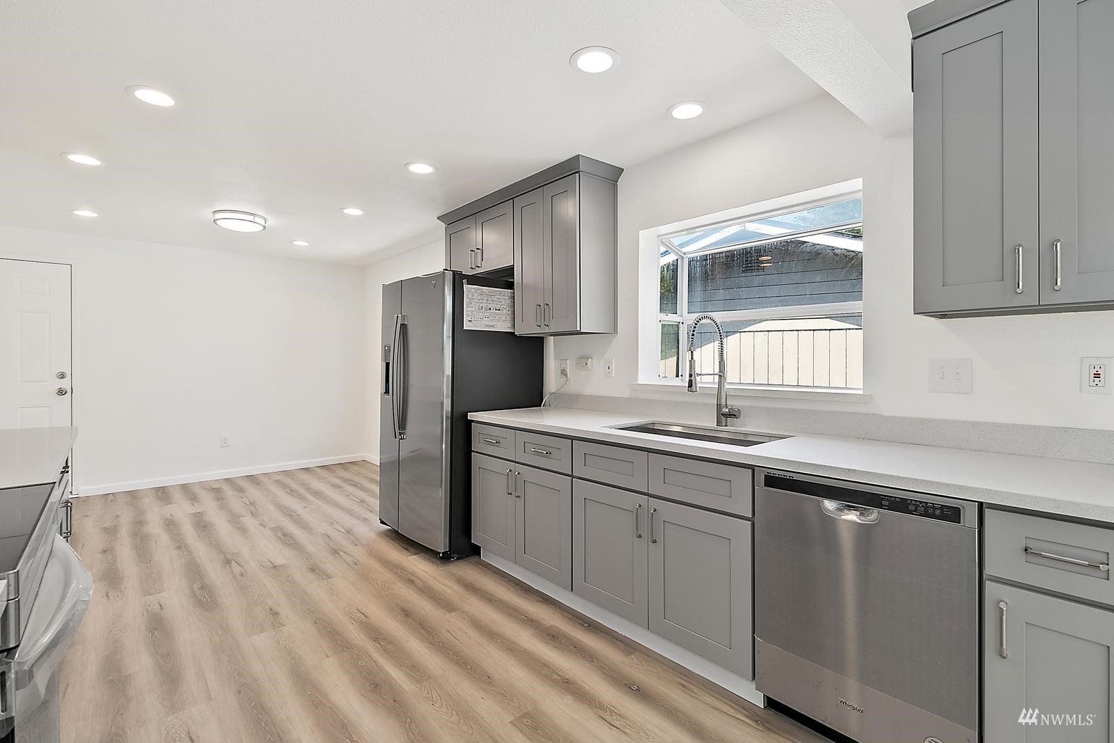 33330 29th Place Southwest Federal Way, WA 98023 - Photo 15 of 37 a kitchen with a sink and refrigerator