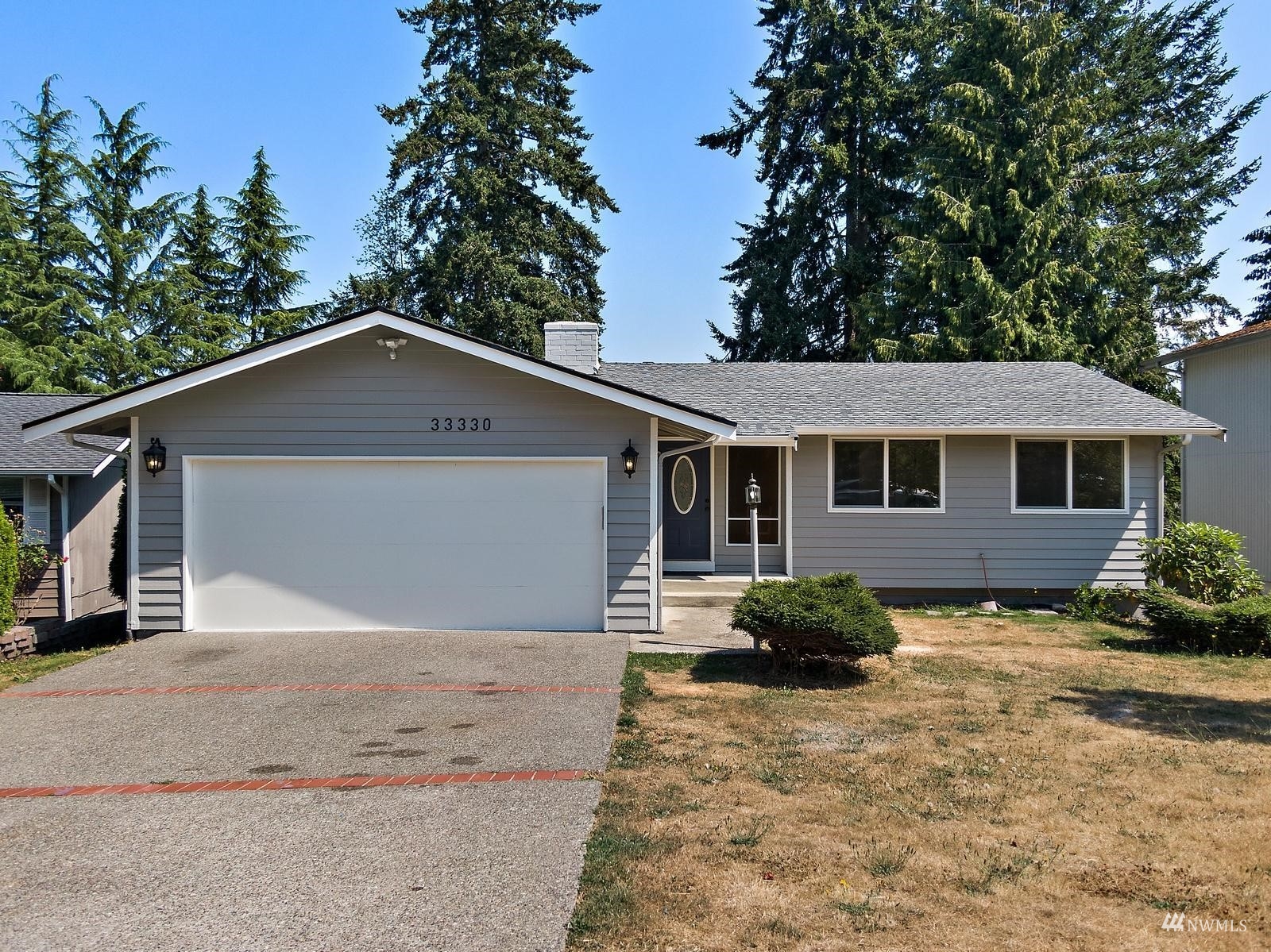 33330 29th Place Southwest Federal Way, WA 98023 - Photo 2 of 37 a front view of a house with garden