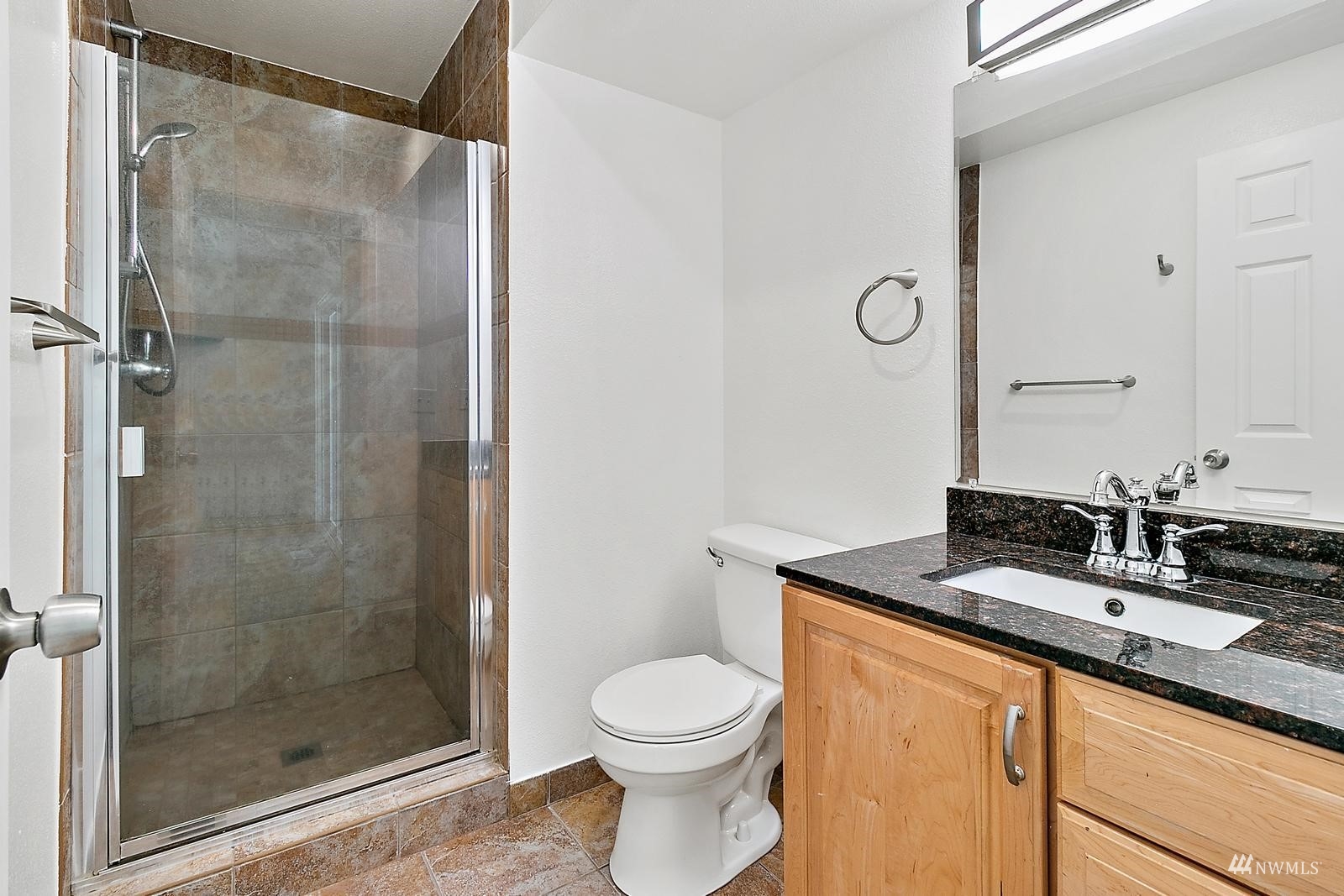 33330 29th Place Southwest Federal Way, WA 98023 - Photo 23 of 37 a bathroom with a granite countertop sink toilet and shower
