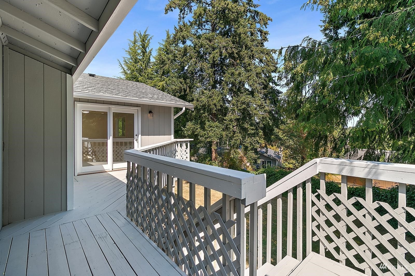 33330 29th Place Southwest Federal Way, WA 98023 - Photo 25 of 37 a view of a wooden deck and a backyard