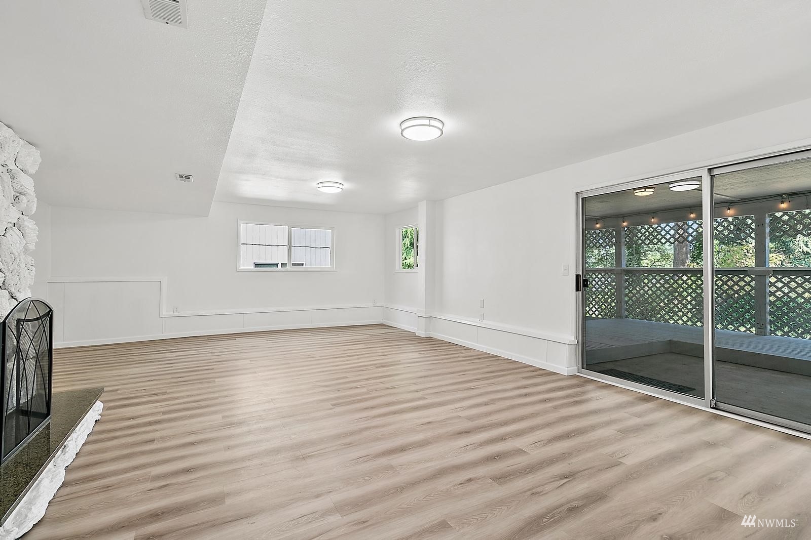 33330 29th Place Southwest Federal Way, WA 98023 - Photo 26 of 37 an empty room with wooden floor and windows