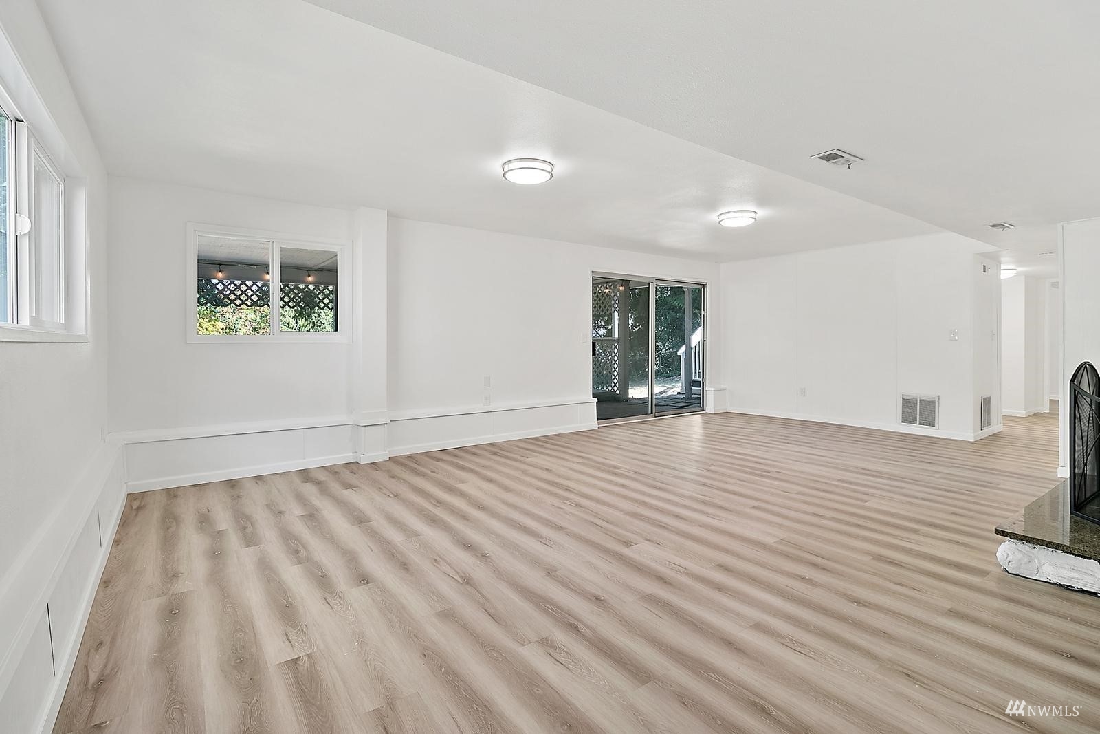 33330 29th Place Southwest Federal Way, WA 98023 - Photo 29 of 37 a view of an empty room with wooden floor and a window