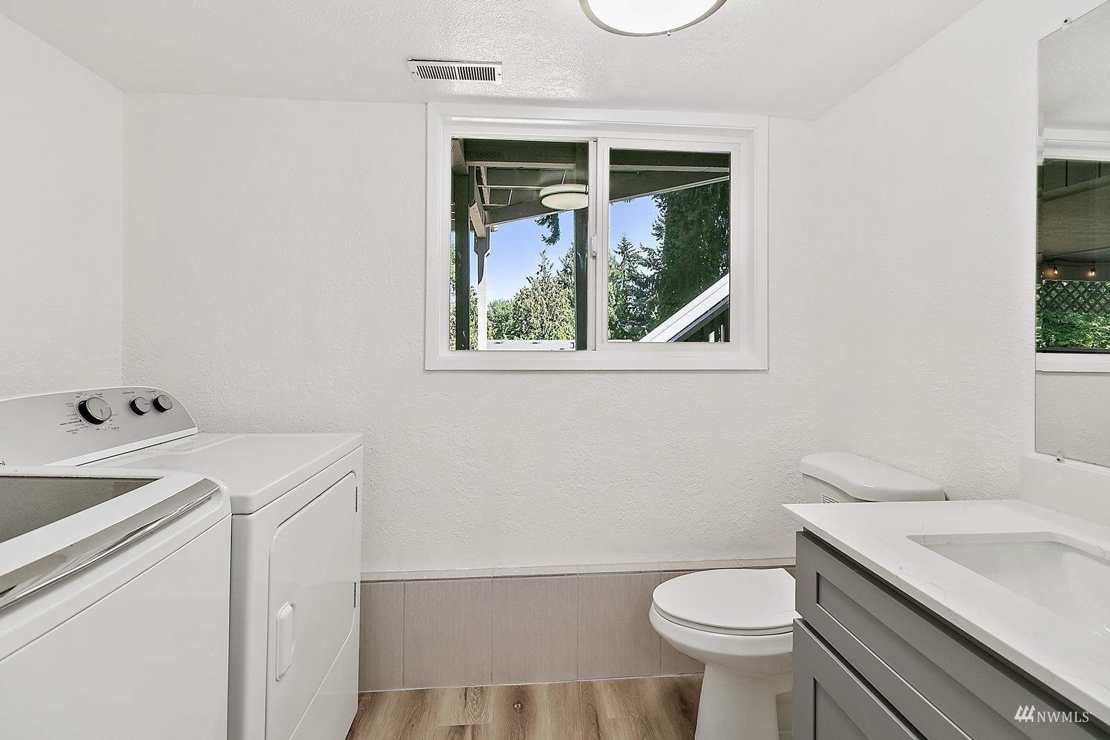 33330 29th Place Southwest Federal Way, WA 98023 - Photo 30 of 37 a bathroom with a sink and a toilet