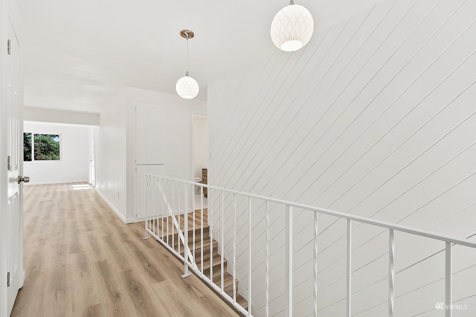 33330 29th Place Southwest Federal Way, WA 98023 - Photo 7 of 37 a view of a hallway with wooden floor
