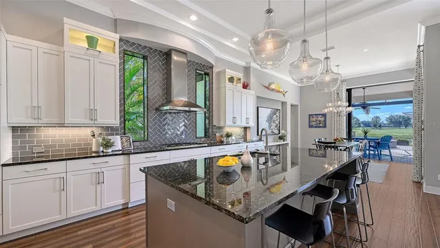 a bedroom with a bed and a potted plant