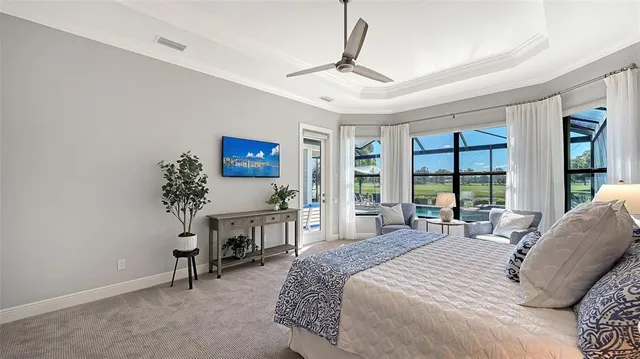 a bedroom with a bed and a chair