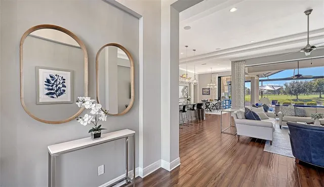 a living room with fireplace furniture and a flat screen tv