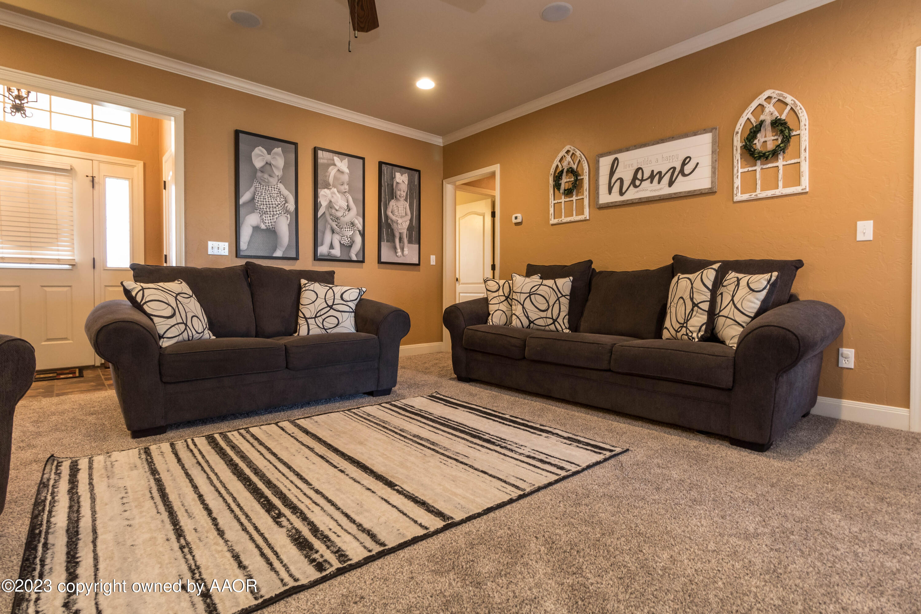 5802 South Rusk Street Amarillo, TX 79118 - Photo 3 of 17 a living room with furniture and a window