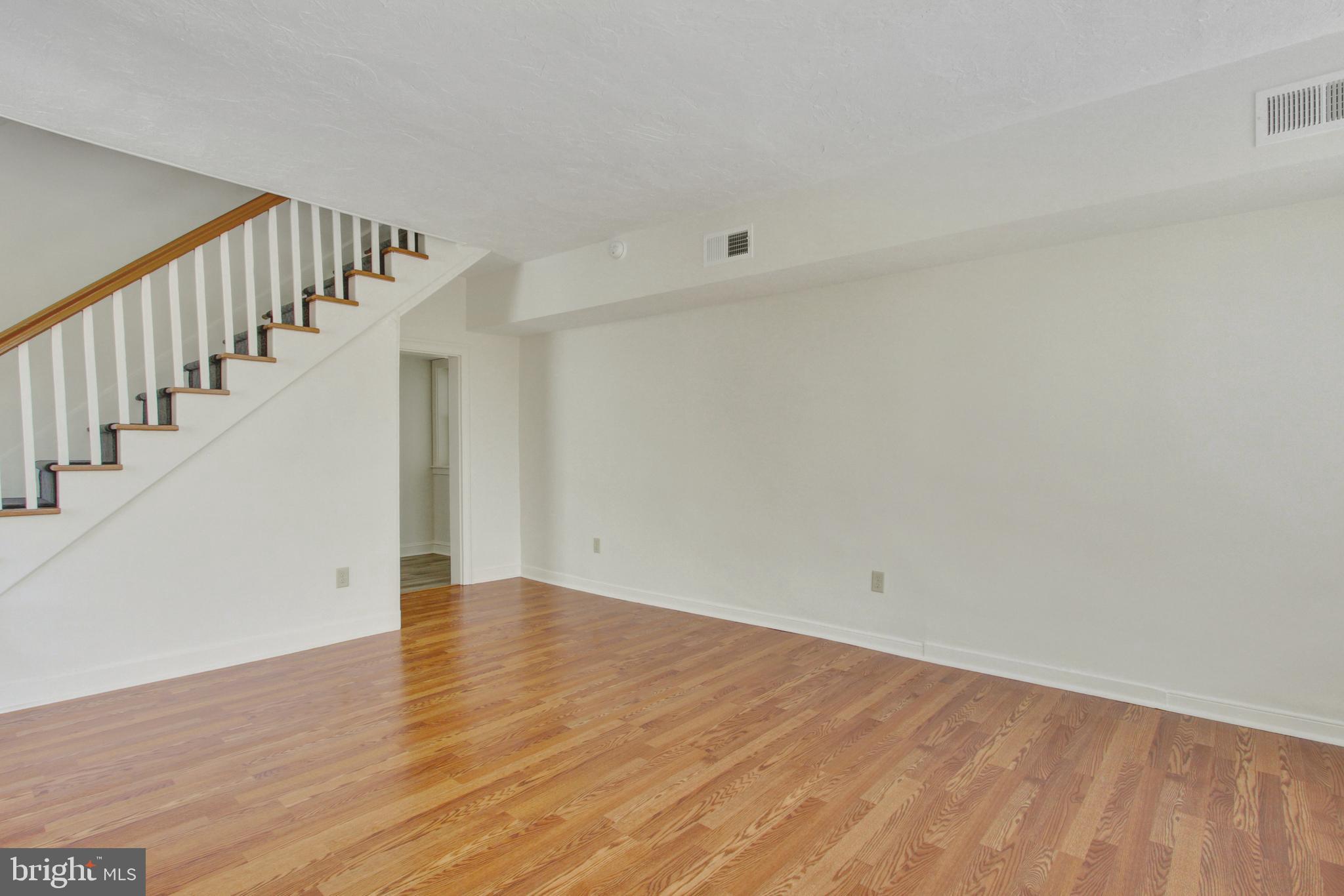 103 Rampike Hill Road Bendersville, PA 17304 - Photo 13 of 22 a view of an empty room with wooden floor