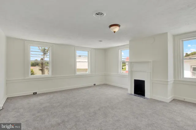 an empty room with windows