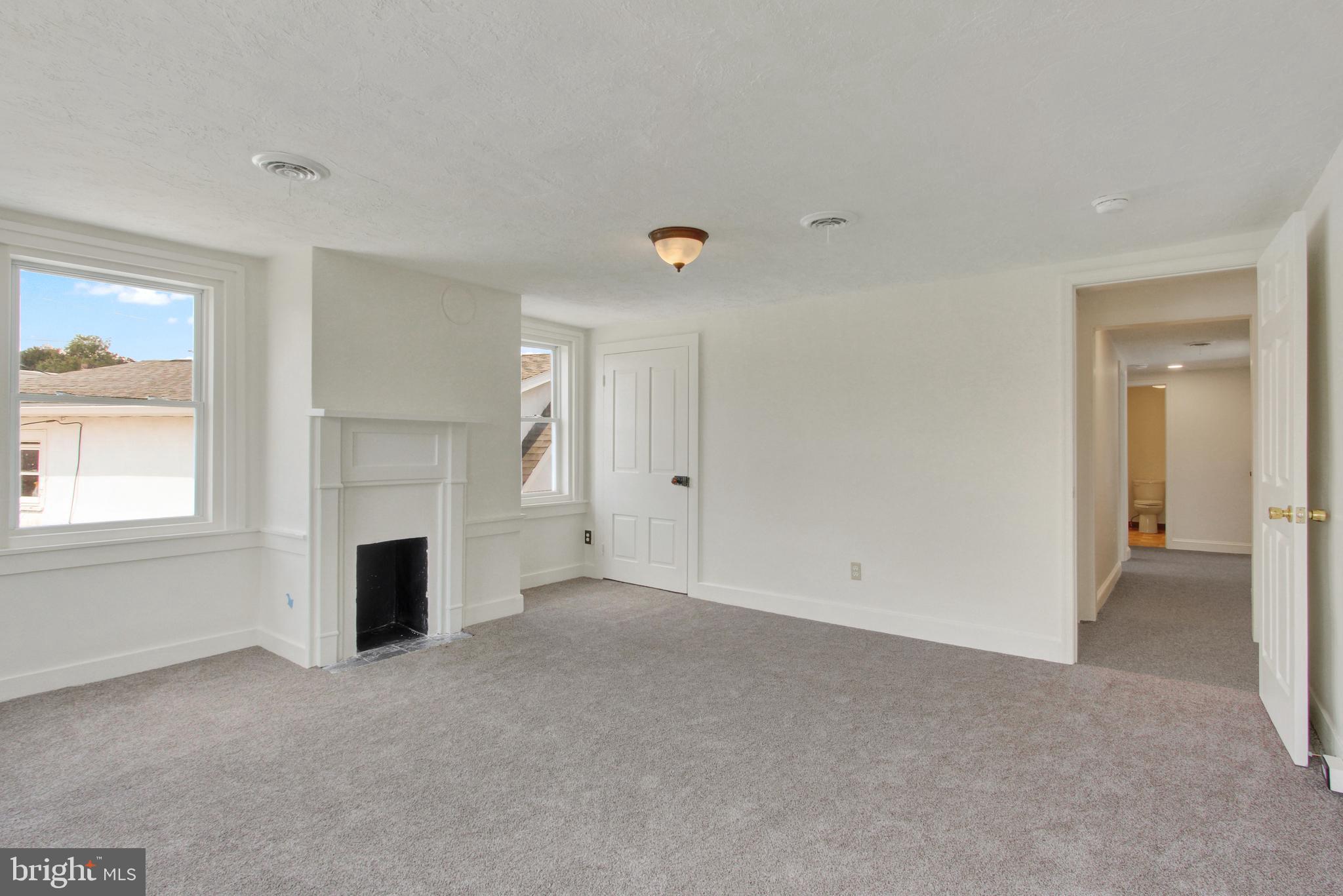 103 Rampike Hill Road Bendersville, PA 17304 - Photo 19 of 22 a view of empty room with a fireplace