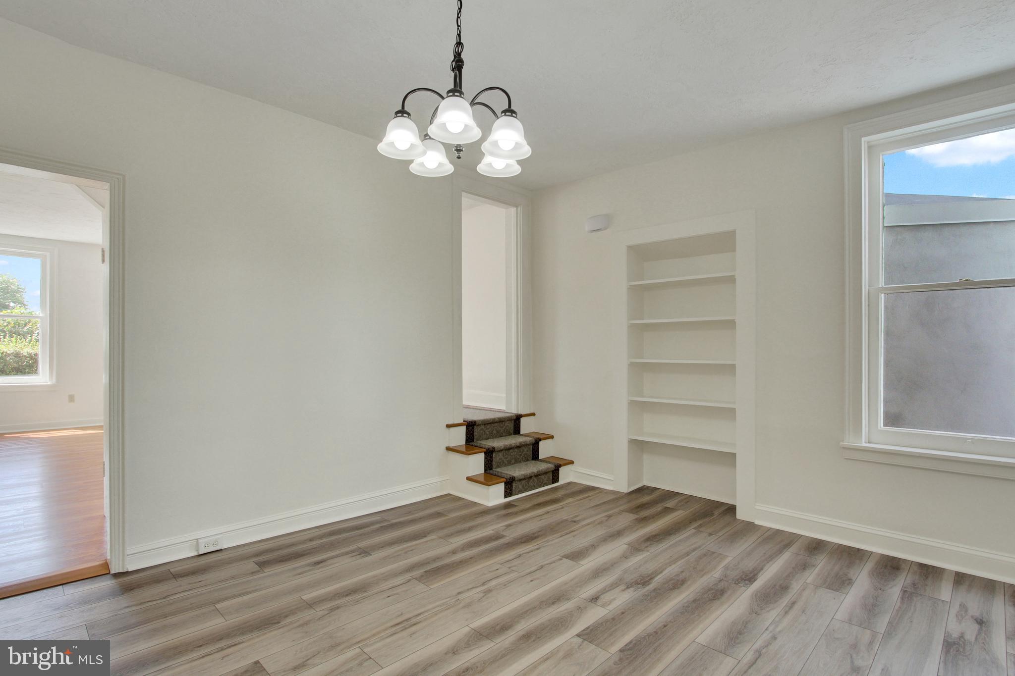 103 Rampike Hill Road Bendersville, PA 17304 - Photo 6 of 22 a view of a room with wooden floor and windows