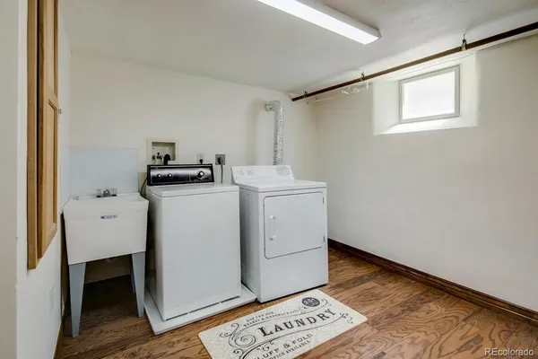 a utility room with closet dryer and washer
