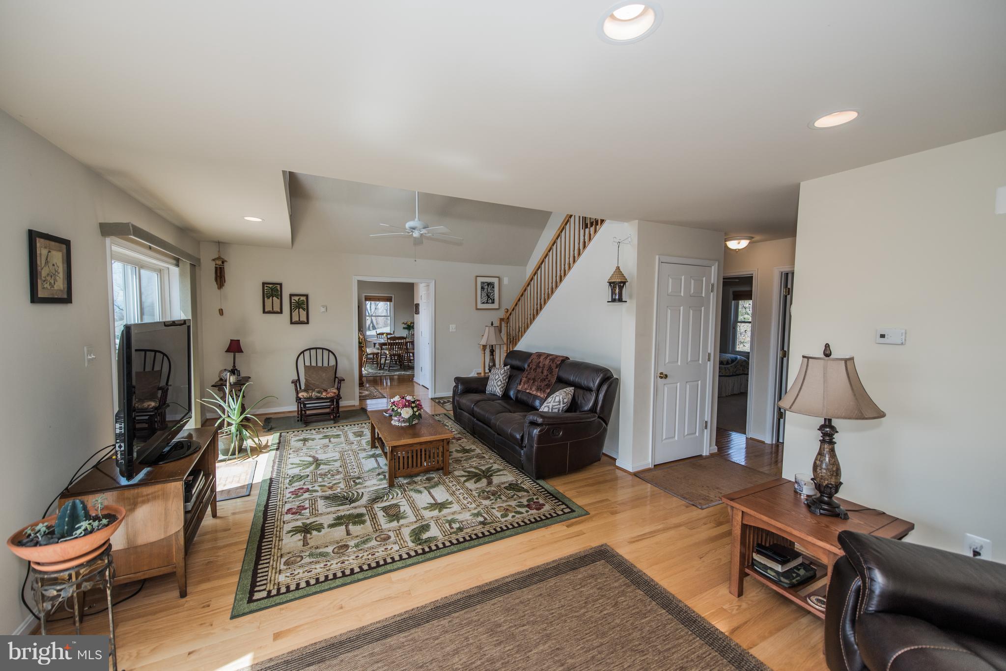 964 Granny Smith Road Linden, VA 22642 - Photo 11 of 30 a living room with furniture and a flat screen tv