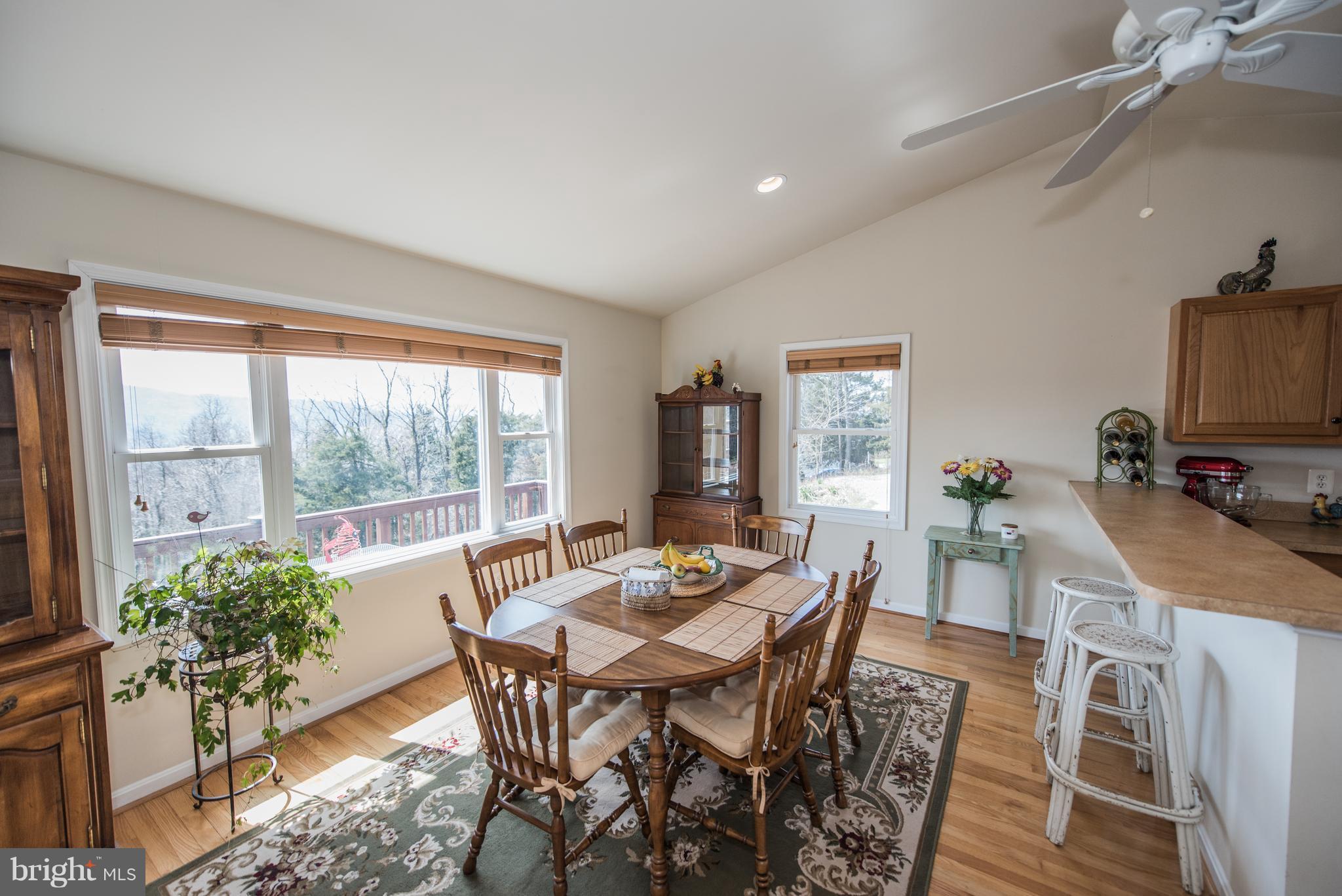964 Granny Smith Road Linden, VA 22642 - Photo 13 of 30 a view of a dining room with furniture window and outside view