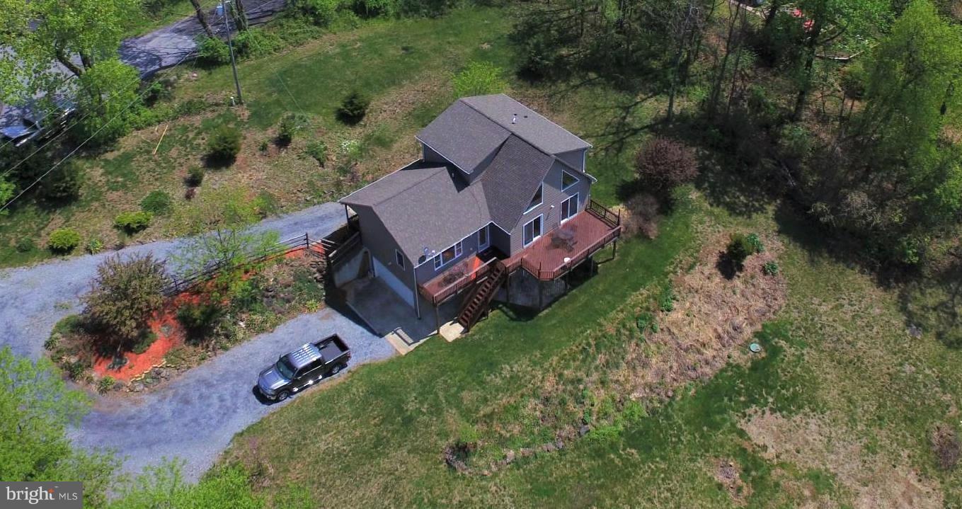 964 Granny Smith Road Linden, VA 22642 - Photo 3 of 30 an aerial view of a house with a yard