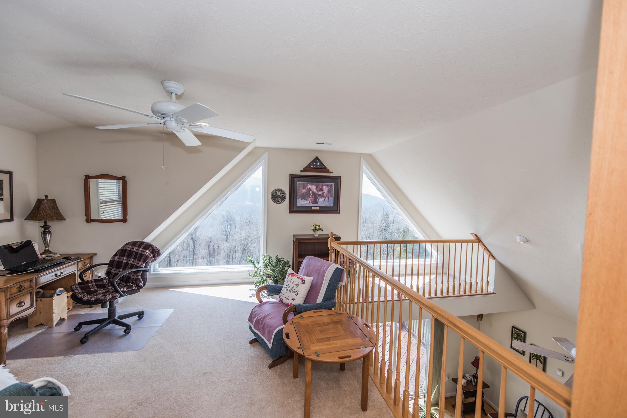 964 Granny Smith Road Linden, VA 22642 - Photo 23 of 30 a living room with furniture and a wooden floor