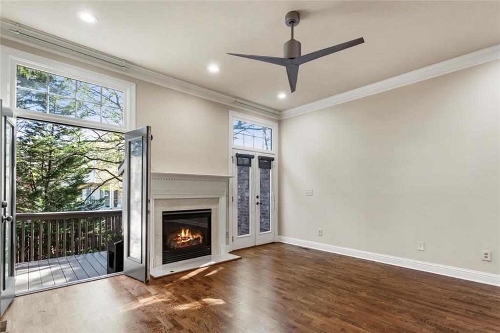 2663 Rivers Edge Drive Northeast Brookhaven, GA 30324 - Photo 15 of 37 a view of an empty room with a fireplace and a window