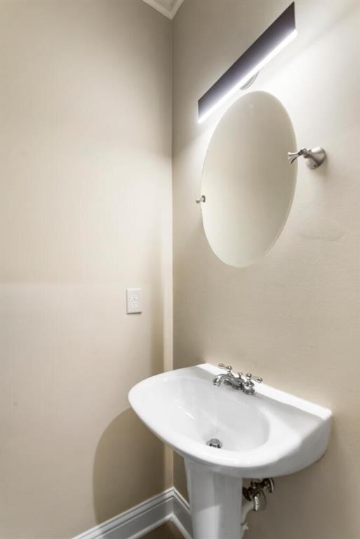2663 Rivers Edge Drive Northeast Brookhaven, GA 30324 - Photo 18 of 37 a bathroom with a sink and mirror