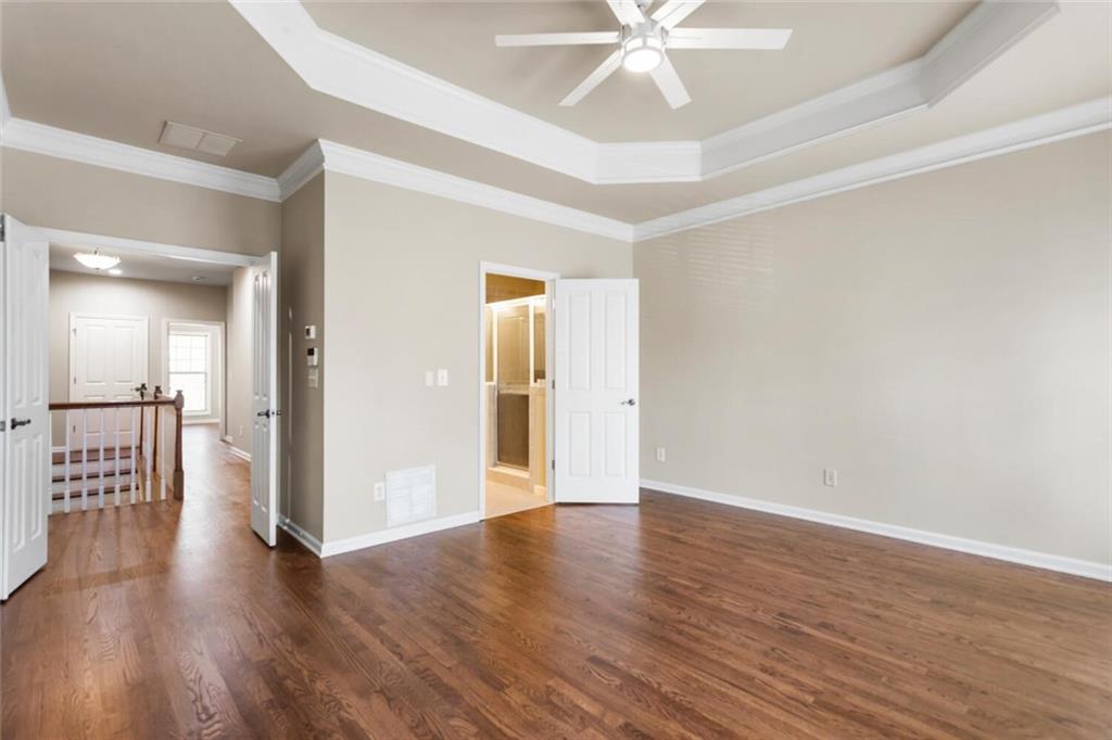 2663 Rivers Edge Drive Northeast Brookhaven, GA 30324 - Photo 20 of 37 a view of a hallway with wooden floor