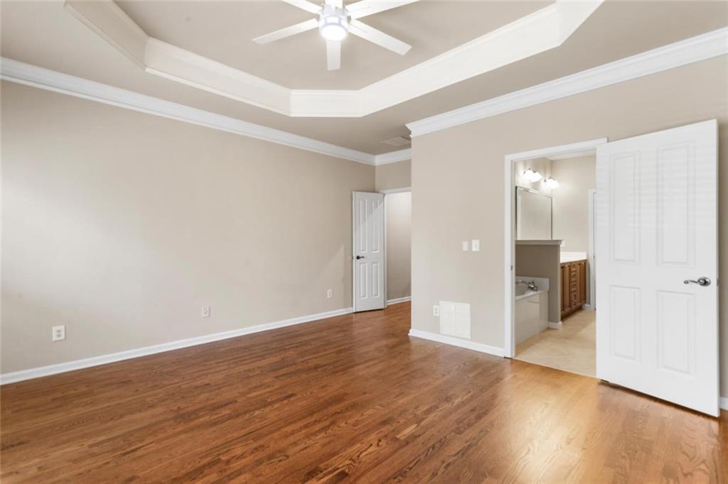 2663 Rivers Edge Drive Northeast Brookhaven, GA 30324 - Photo 22 of 37 a view of an empty room with wooden floor