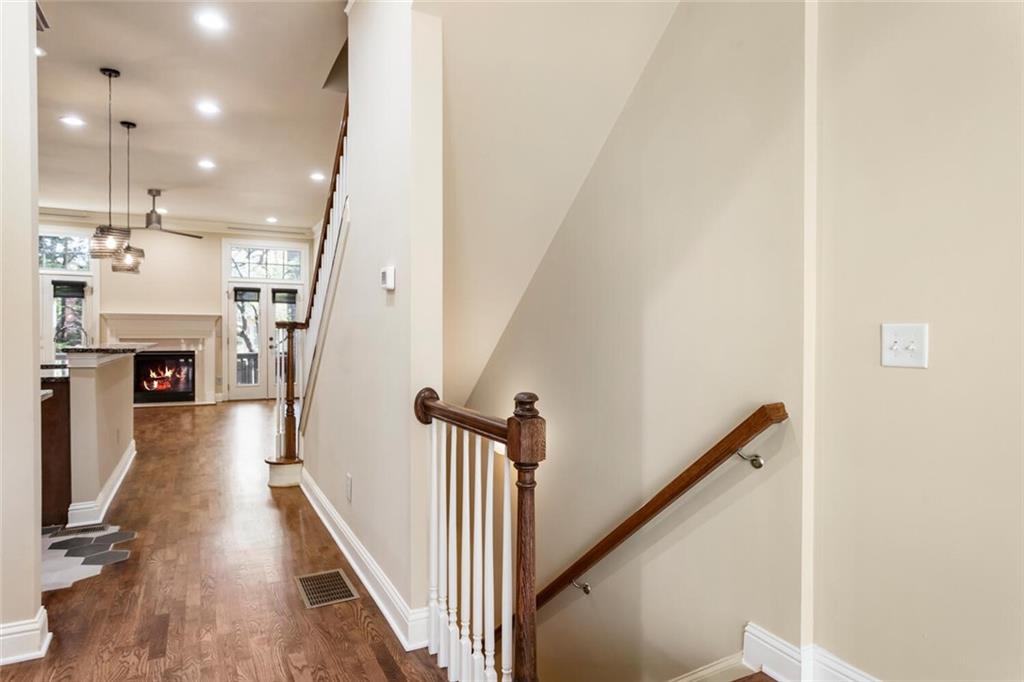 2663 Rivers Edge Drive Northeast Brookhaven, GA 30324 - Photo 30 of 37 a view of a hallway with wooden floor and staircase