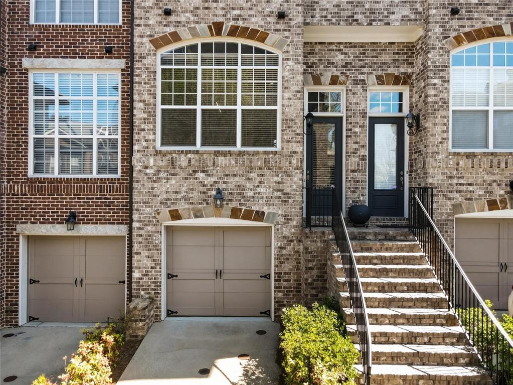 2663 Rivers Edge Drive Northeast Brookhaven, GA 30324 - Photo 3 of 37 a front view of a house with a garden