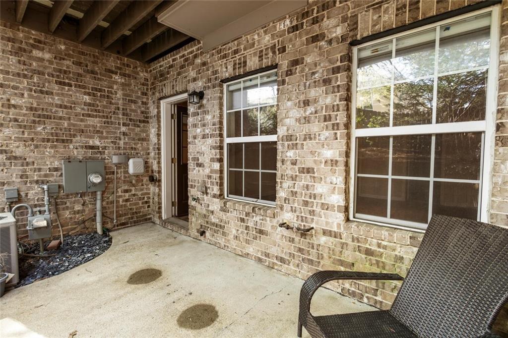 2663 Rivers Edge Drive Northeast Brookhaven, GA 30324 - Photo 35 of 37 a view of a door and chair in the patio